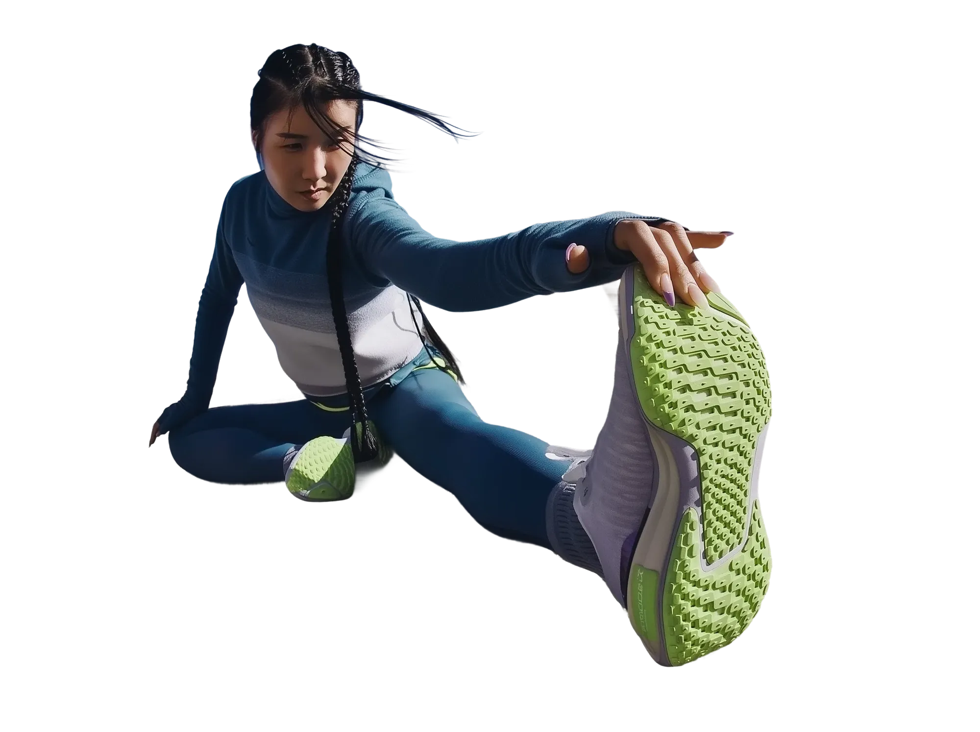 A runner in a seated toe-touch stretch, reaching out of an angled panel of road and sky